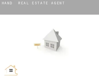 Hand  real estate agent